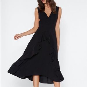 Black ruffled dress with criss cross straps